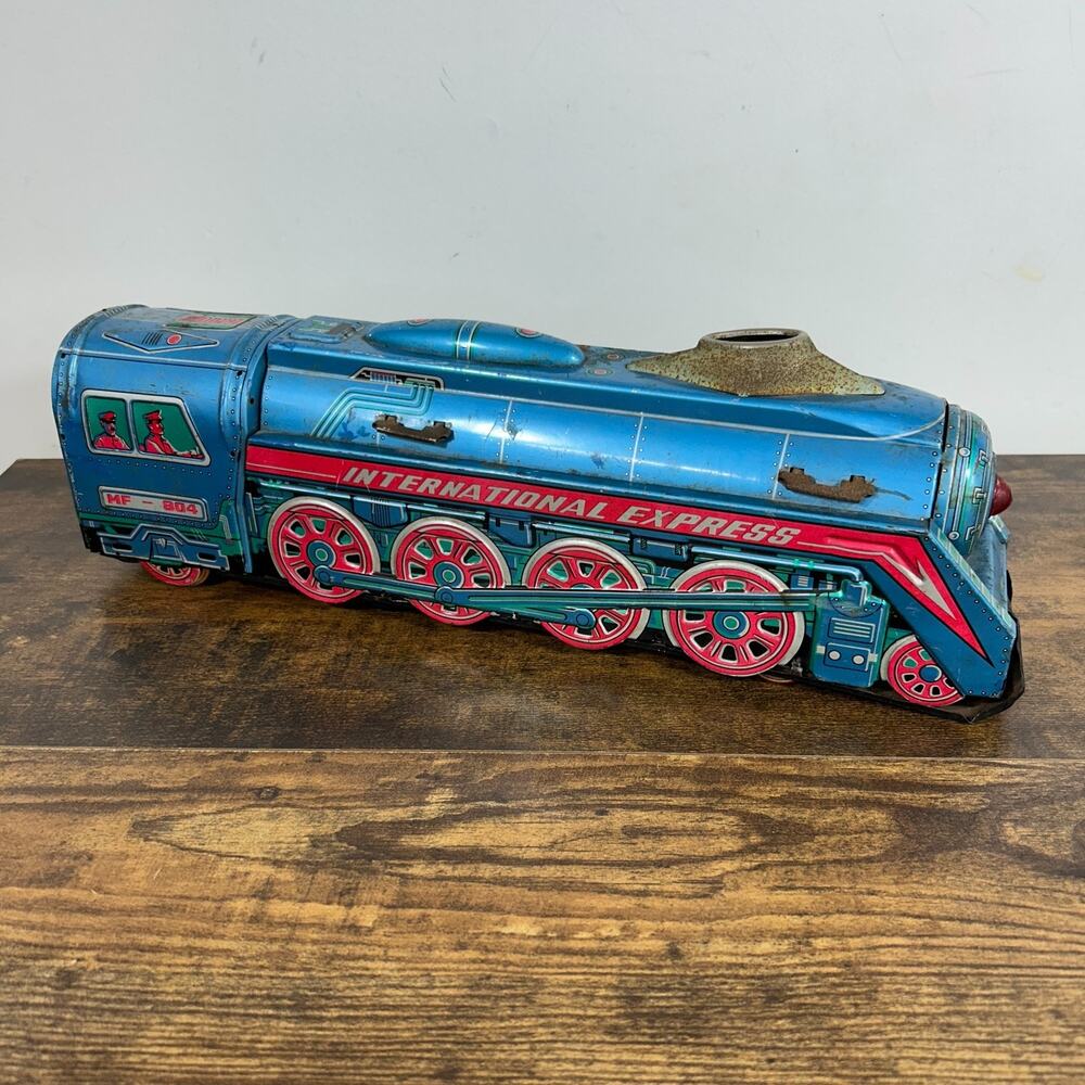 Vintage "International Express" Tin Metal Toys Train Locomotive Untested